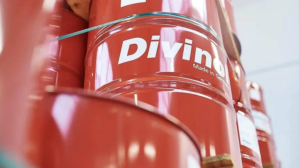 Divinol drums marked “Made in Germany” in the Zeller+Gmelin warehouse